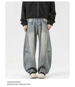 Detail view of American vintage washed wide-leg jeans with paneled stitching details