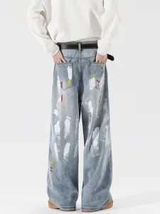 Men's retro light blue straight jeans with artistic white and red paint splatter graffiti