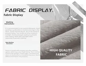 Detailed view of gray fleece lining texture with fabric care and washing instructions