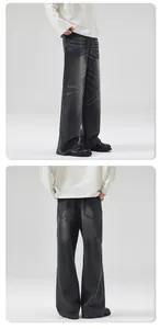 Détail d'un jean large à taille haute avec délavage vintage et coupe décontractée