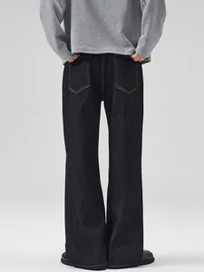 Men's deep blue raw denim fleece jeans with wide leg cut and contrast stitching pockets