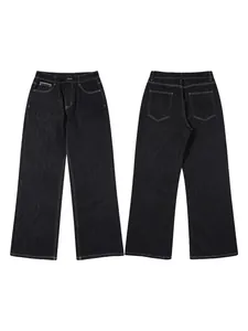Front and back view of men's deep black wide-leg denim jeans with white contrast stitching