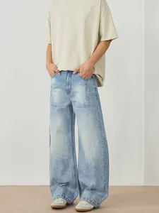 Jean large en denim délavé vintage bleu clair à coupe décontractée pour hommes et femmes