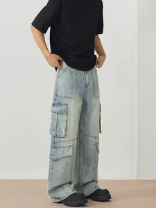 Men's light blue vintage wash cargo jeans with multiple pockets and a straight-leg fit
