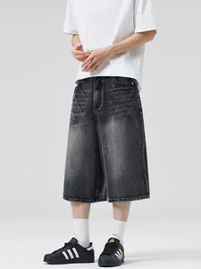 Men's grey washed denim wide-leg shorts with vintage texture and street style fit