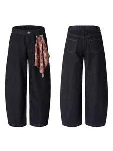 Jean baggy bleu foncé avec bandana amovible et coupe large pour un style décontracté