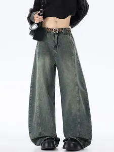 Retro washed baggy curved jeans for men and women with vertical seams and leopard belt