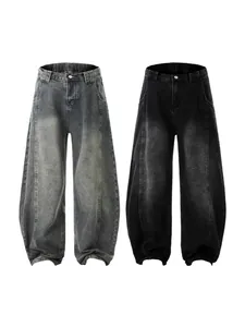 Retro washed baggy curved jeans in grey-blue and charcoal black with paneling details