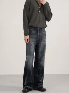 Men's dark grey Henley knit sweater and heavy washed wide-leg denim jeans set