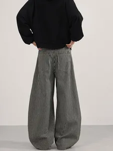 Vertical striped high-waisted wide-leg pants with large back pockets in minimalist style
