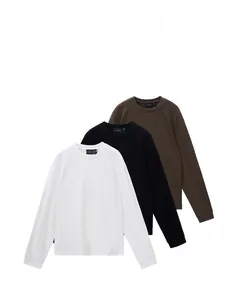 Close-up of soft cupro long-sleeve T-shirts in white black and brown colors