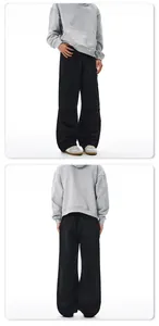 Front and back views of black canvas cargo pants with elastic waist and multi-pocket design