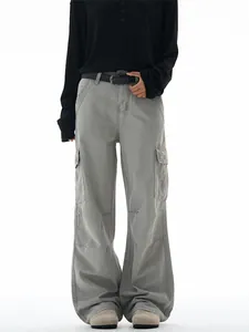 Vintage olive green wide-leg cargo pants with pockets and belt for casual streetwear style