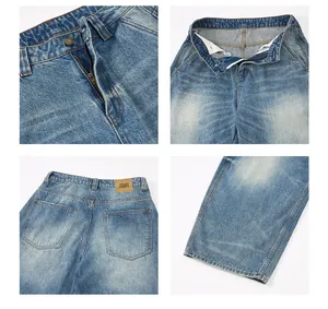 Détails du jean baggy bleu délavé avec boutons métalliques et écusson de marque en cuir