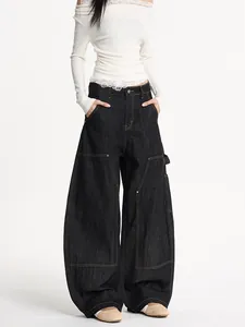 Retro baggy dark denim workwear pants with contrast stitching and multi-pocket design