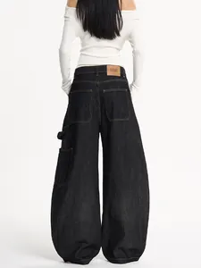 Baggy retro black workwear denim jeans featuring oversized fit and cargo pocket styling