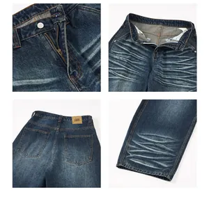 Details von Vintage-Waschjeans mit Lederetikett und Whisker-Textur am Bund
