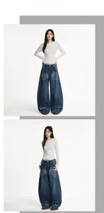 Detail der baggy dunkelblauen Vintage-Jeans mit Cat-Whisker-Waschung und Oversized-Schnitt