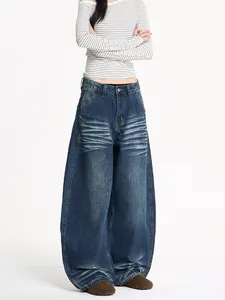 Dunkelblaue Baggy-Jeans im Retro-Look mit gewaschenem Whiskering und weitem Bein