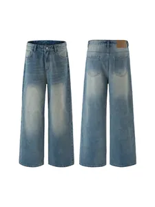 Front and back view of men's vintage washed light blue straight leg wide denim jeans