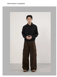 Detail of vintage loose-fit multi-pocket cargo pants paired with a black casual jacket