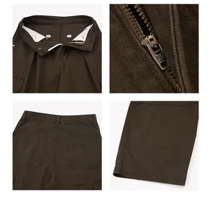 Detail view of brown cargo pants featuring YKK zipper, pockets, and cotton twill texture