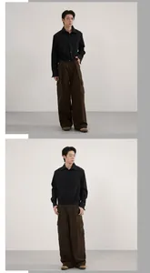 Detail of loose-fitting brown cargo pants with large side pockets and black shirt outfit