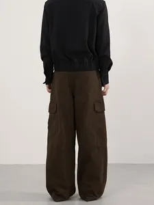 Vintage dark brown multi-pocket cargo pants with a wide-leg fit for a casual workwear style