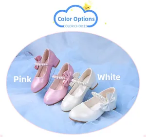 Detailed comparison of pink and white girls princess shoes with pearls and bows