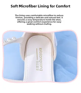Detailed close-up of micro-fiber lining and pearl accents on kids princess shoes