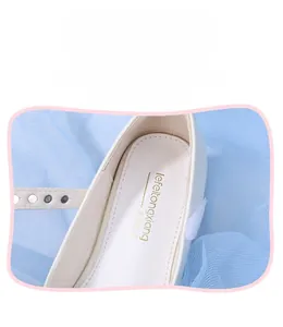 Detail view of the soft microfiber lining and breathable insole of girls white dress shoes