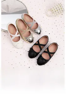 Detailed view of girls princess ballet flats in white, gold, silver and black colors