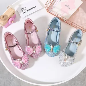 Glittery girls princess shoes with pearl bows in pink, blue, and silver colors