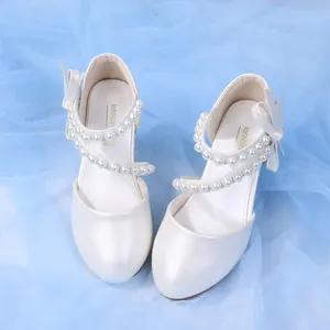 Sweet pearl white princess shoes for girls with bow accents and elegant pearl cross straps
