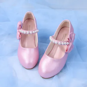 Pink Mary Jane princess shoes for girls with pearls and bow detail on soft soles
