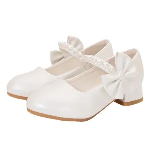 White pearlescent Mary Jane princess shoes with pearl straps and large side bows