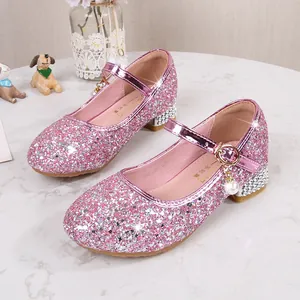 Sparkly pink sequined Mary Jane shoes for girls featuring pearl charms and rhinestone heels