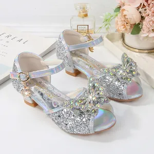Sparkly silver glitter girls princess shoes with rhinestone bow and ankle strap