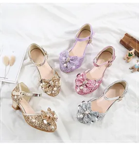 Detailed view of sequin girls' princess shoes with bow and pearl buckle in four colors