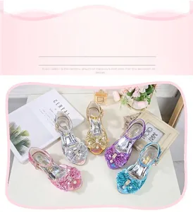 Detailed display of colorful sequin princess shoes for girls with pearl bows