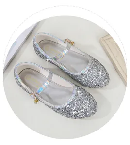 Detail of silver sequin Mary Jane shoes for girls with pearl pendant and laser trim