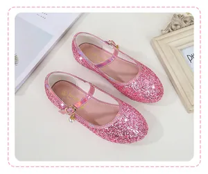 Detail of pink sequin Mary Jane shoes with pearl pendant and buckle for girls