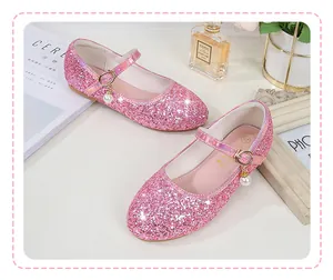 Detail of pink sequin girls Mary Jane shoes featuring pearl pendant and metal buckle