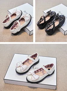 Détails de chaussures Mary Jane pour filles en cuir verni avec double nœud élégant