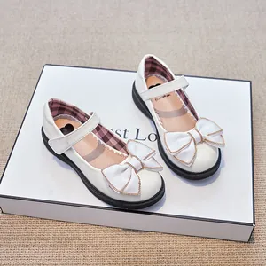 Chaussures Mary Jane blanches pour filles avec grand nœud et bordure en chaîne dorée