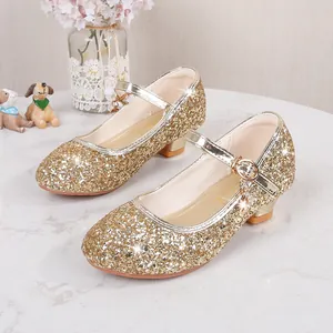 Sparkly gold sequin Mary Jane shoes for girls featuring a low block heel and buckle strap