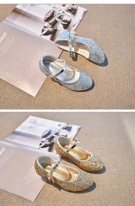 Detailed view of sparkly glitter Mary Jane shoes for girls with star and moon charms