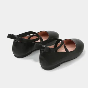 Black Mary Jane ballet flats for girls with cross elastic straps and rear bow detail