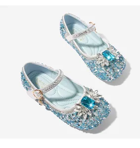 Detailed view of sparkly blue girls princess shoes with large jewel and sequins