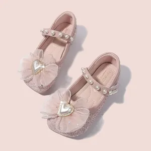 Scarpe Mary Jane rosa glitterate per bambina con fiocco in tulle e perla a cuore